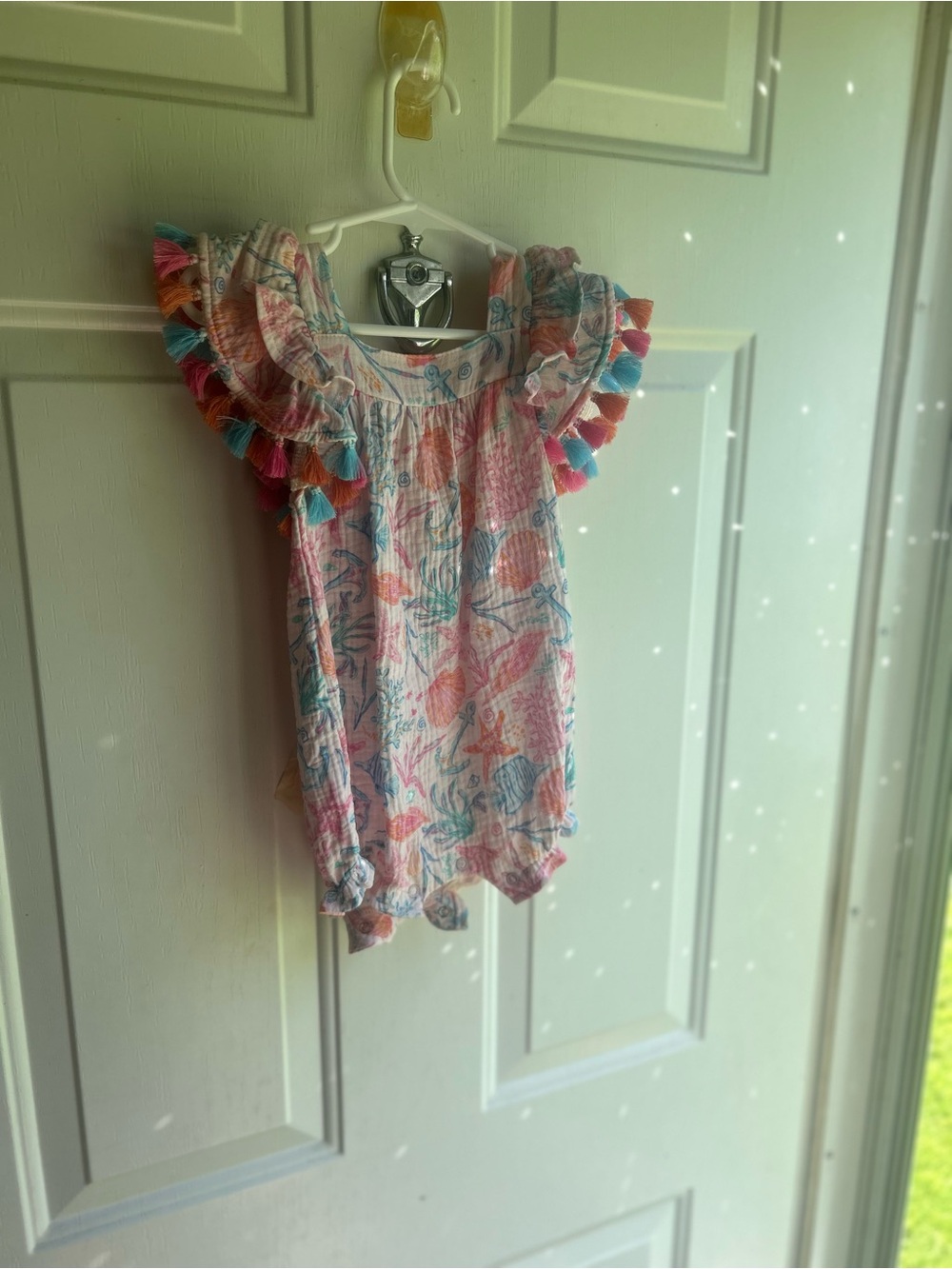 Mud pie Seashell Print Romper with Tassel Trim